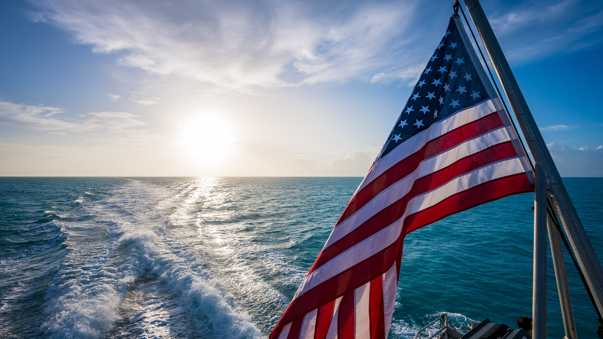 The American flag waving in the wind